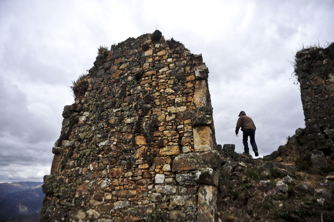 A tourist visits the pre-Incan ruins at the Marcahuamachuco archaeological site in the highlands of La Libertad.