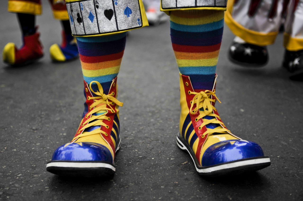 Clowns take part in a parade in Lima in honor of Peru's national clown day in May 2012.