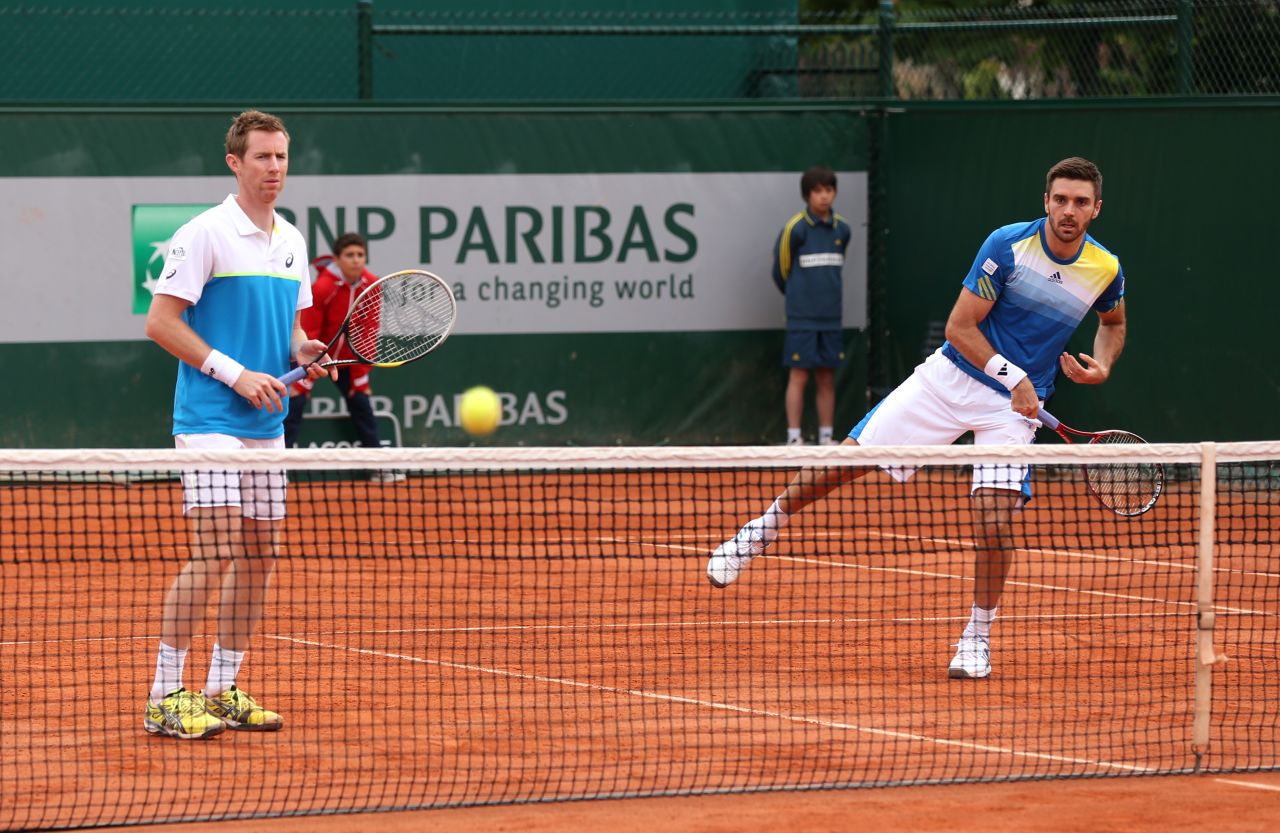 Jonathan Marray, left, and Colin Fleming of Great Britain play Feliciano Lopez of Spain and Andre Sa of Brazil on May 30.