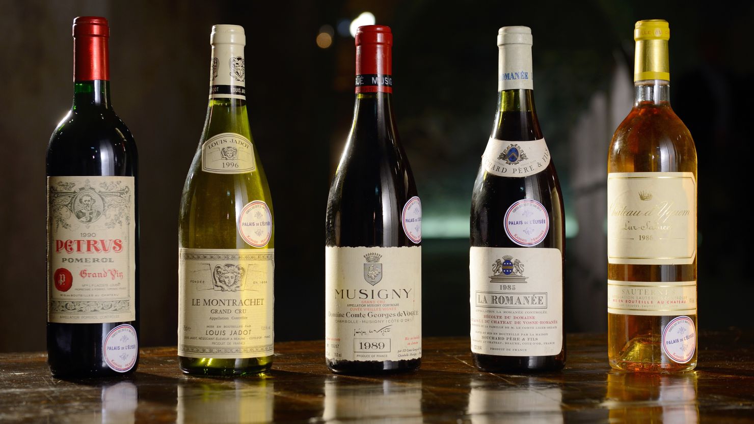 A selection of wine, including the bottles seen above, will be auctioned off by France's presidential palace.