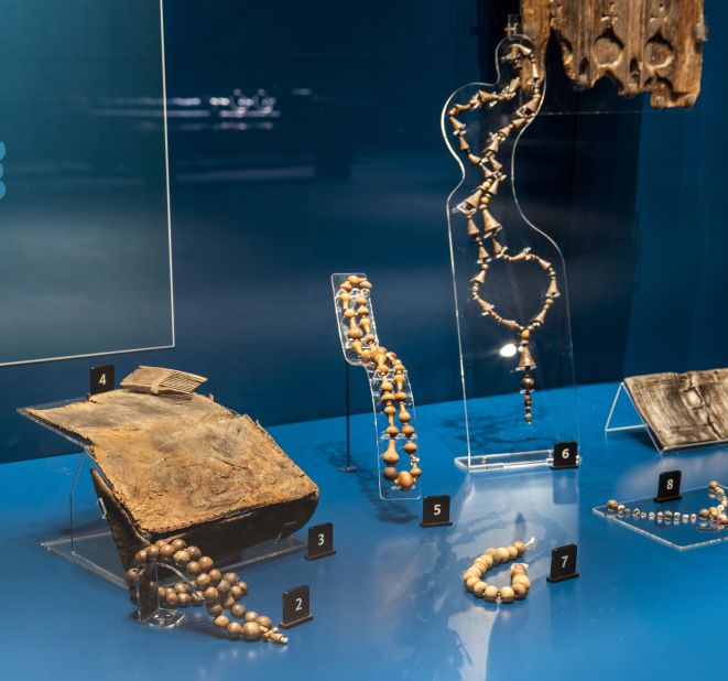 The Mary Rose sank during the time when Henry VIII was banning Catholicism in England, but rosary beads weren't yet illegal. As the Mary Rose was the King's ship it's assumed that rosary beads were still in regular use at this time. 