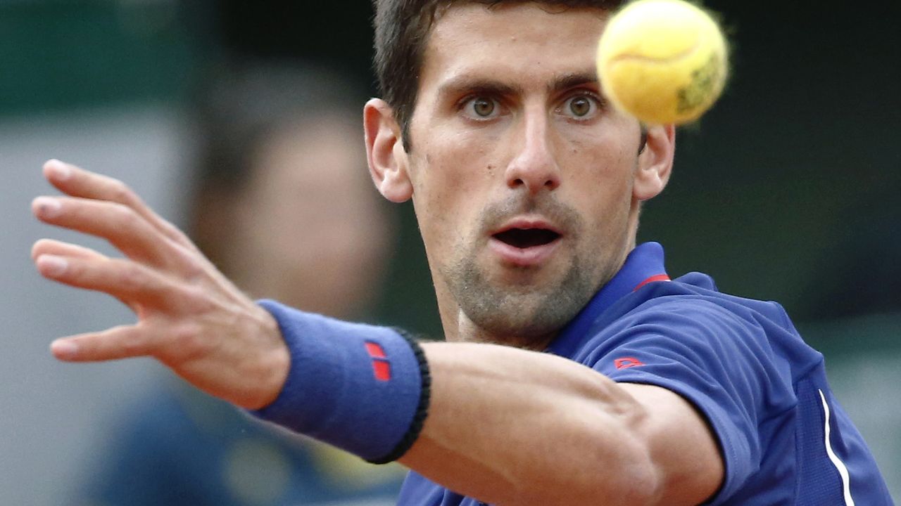 Serbia's Novak Djokovic prepares a shot to Argentina's Guido Pella on May 30.