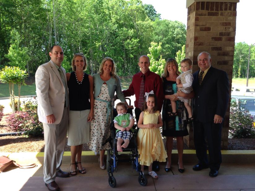 Tripp, his parents and the extended family pose for a family photo in late spring. "It was so awesome bringing Tripp home," Halstead said. "It's starting to feel like we are putting our lives back together." 