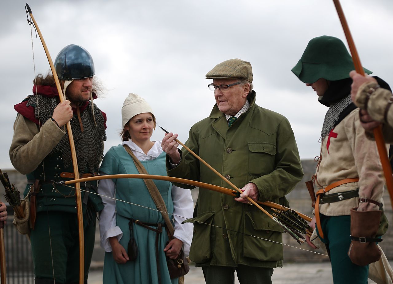 Actor and longbow expert Robert Hardy talks with Purbrook Bowmen at Southsea Castle as part of a day of events to mark the opening of the Mary Rose Museum in Portsmouth.