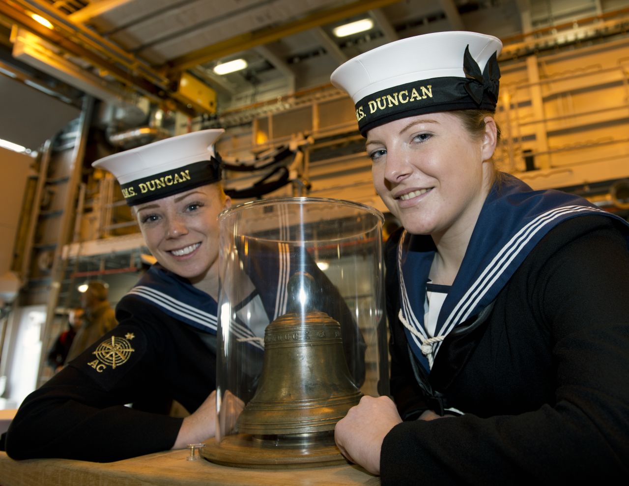 Able Seaman Fiona MacLennan, left, and Able Seaman Megan Ryan attend the opening ceremony aboard HMS Duncan, the latest Type 45 destroyer.