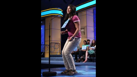  Amber Born of Marblehead, Massachusetts, celebrates after she spells "pediculicide," an agent for destroying lice, in round five on May 30.