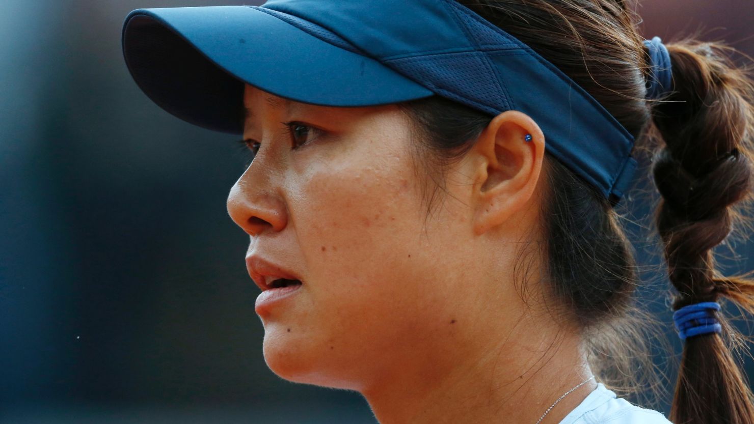 A disconsolate Li Na is headed for defeat in her second round match against Bethanie Mattek-Sands in Paris. 