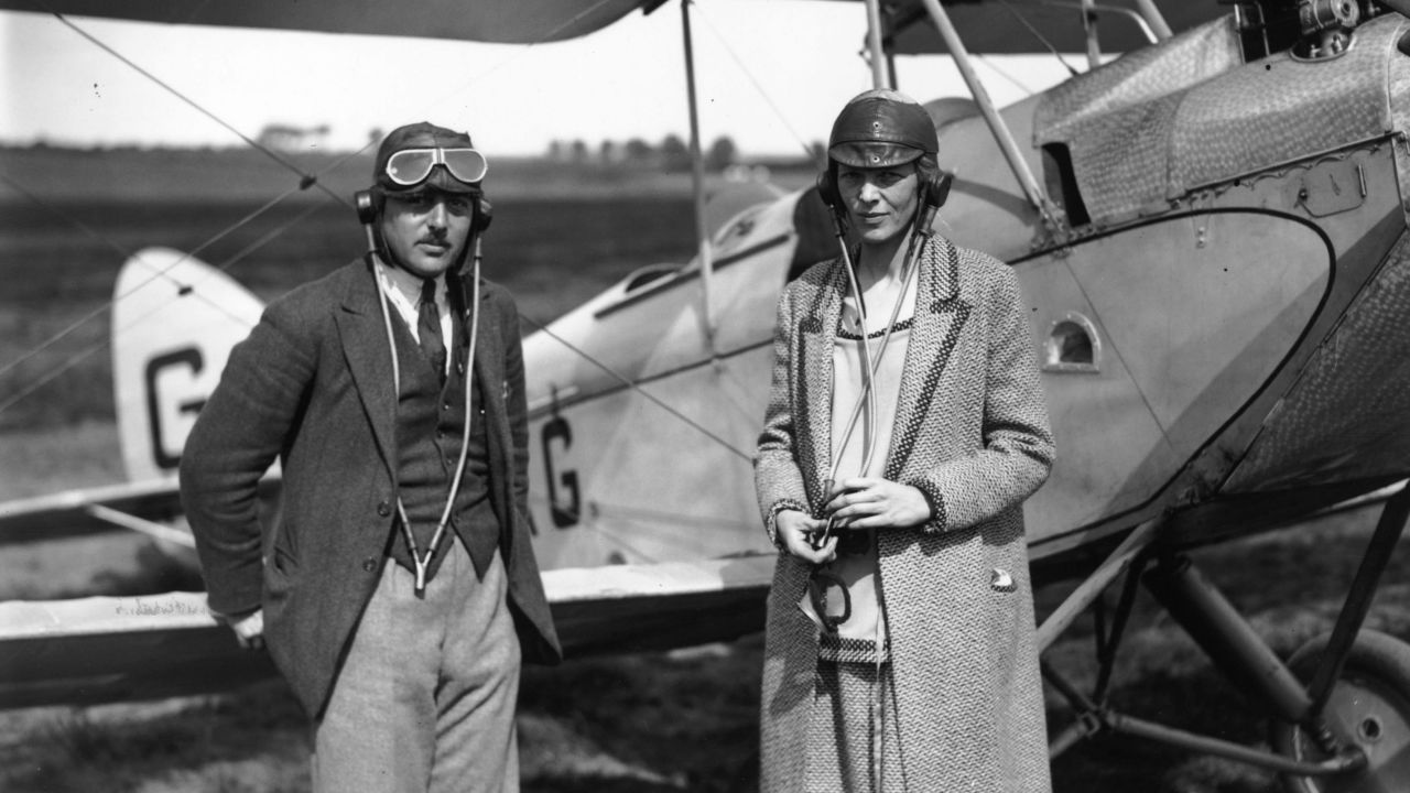 Earhart poses with Capt. A. N. White in Northolt, England, on June 20, 1928.
