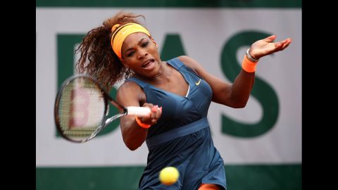 Serena Williams of the United States plays a forehand against Sorana Cirstea of Romania on May 31. Williams won 6-0, 6-2.