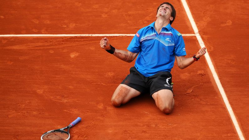 Spain's Tommy Robredo celebrates match point against France's Gael Monfils on May 31. Robredo beat Monfils 2-6, 6-7(5), 6-2, 7-6(3), 6-2.