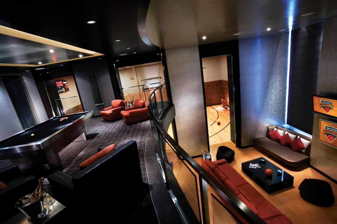 Yep, that's a full-sized basketball court behind those doors. For a mere $25,000 a night, hoop dreams do come true. Oh, relax, that's still less than LeBron James makes in a single quarter of play.
