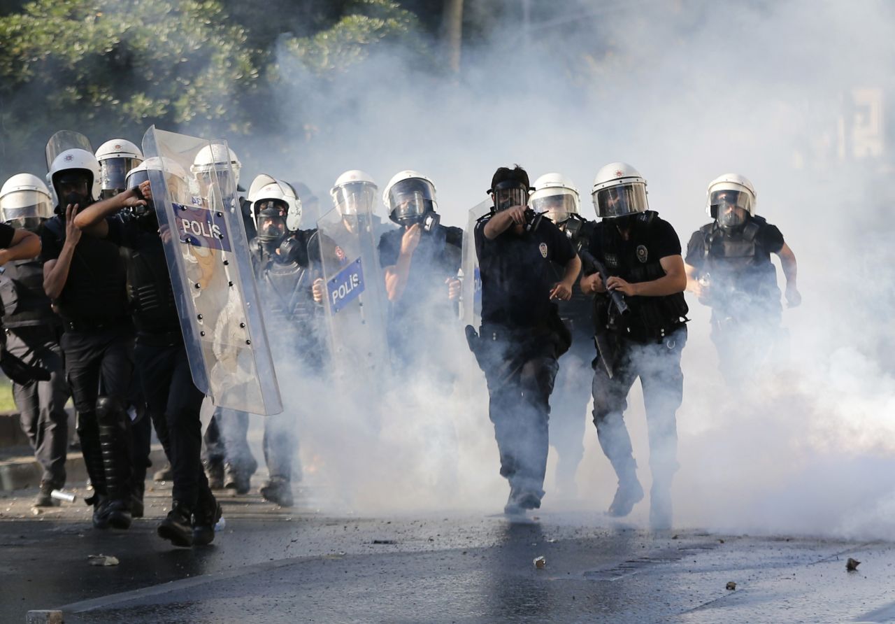 Riot police use tear gas in an attempt to disperse the crowd of demonstrators on June 1. 