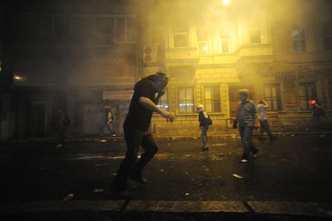 Demonstrators set up barricades and build a fire as they clash with Turkish officers on May 31.