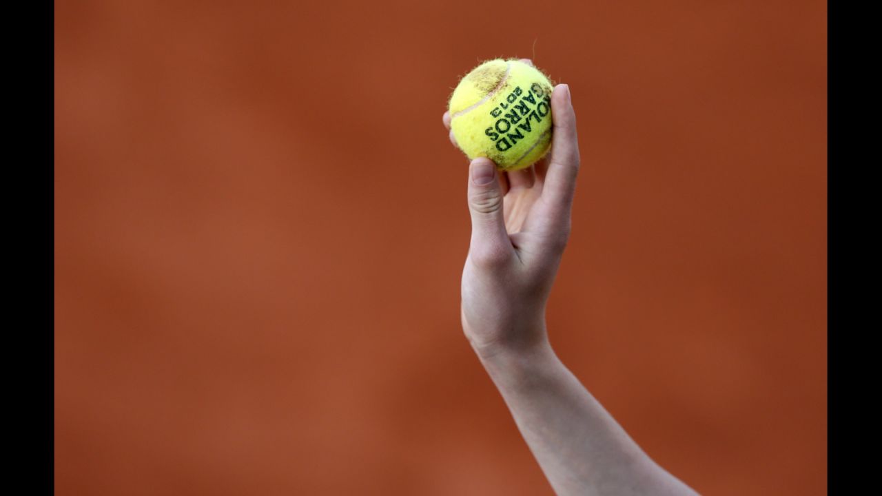 A ball boy holds a ball during a third round match a on June 1. 