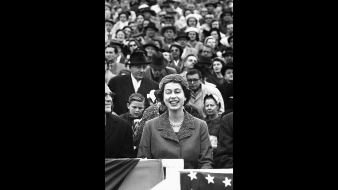 Queen Elizabeth II watches a University of Maryland vs. University of North Carolina football game at Maryland's Byrd Stadium during her 1957 official visit to the United States.