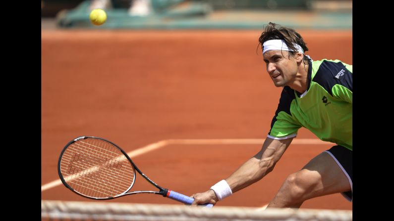 Spain's David Ferrer returns to South Africa's Kevin Anderson on June 2. Ferrer won 6-3, 6-1, 6-1.