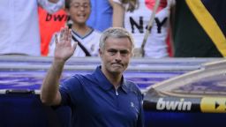 Jose Mourinho waves to the crowd following his final match in charge of Real Madrid -- a 4-2 home win against Osasuna. 