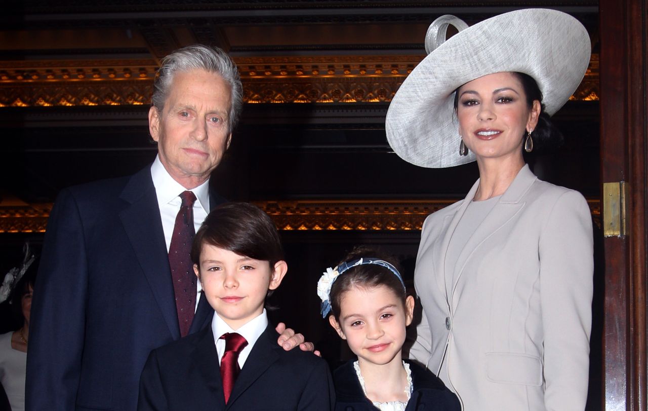 British-born actress Zeta-Jones, right, arrives with Douglas and their children Dylan, left, and Carys in 2011 at Buckingham Palace in London. In January, Douglas announced in a "Today Show" interview that his cancerous tumor is gone.