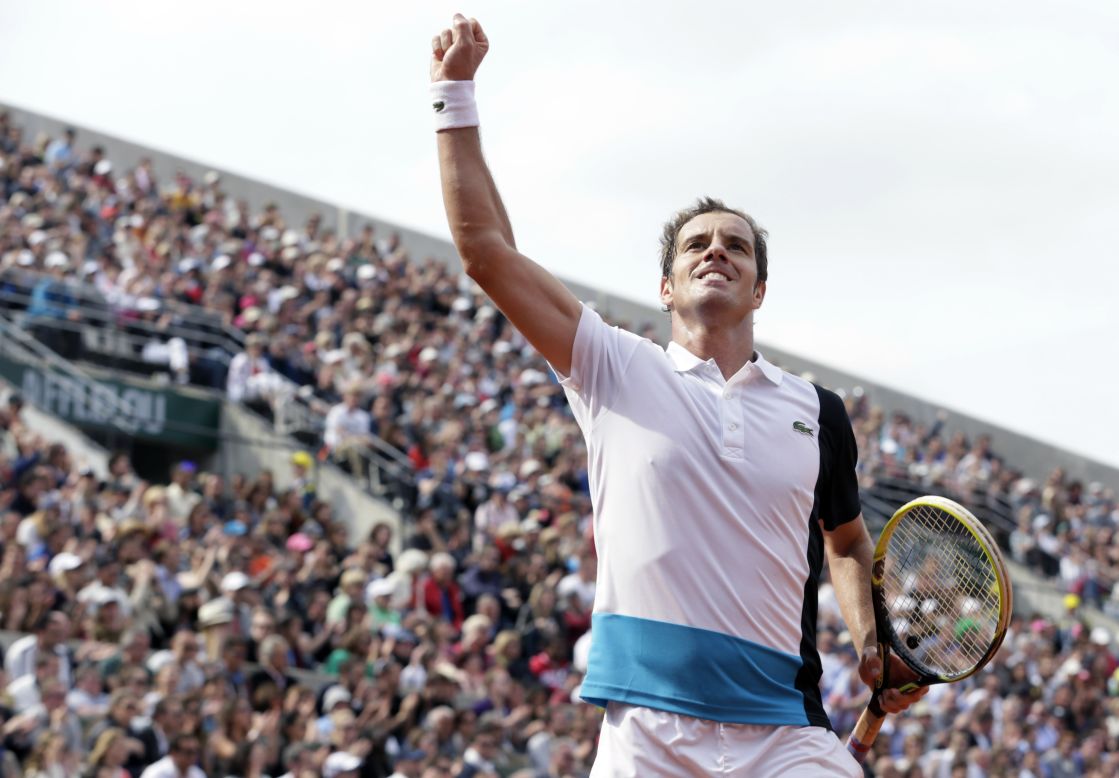 After winning a second set against Switzerland's Stanislas Wawrinka, France's Richard Gasquet celebrates at the French Open on June 3.  
