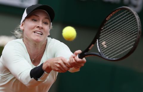 During a round of 16 match on June 3, the United States' Bethanie Mattek-Sands hits a return to Russia's Maria Kirilenko.