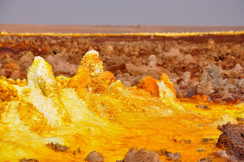 The Danakil Depression desert basin reaches up to 125 meters below sea level due to the tectonic activity caused by plate movements in the region, and is home to fields of sulphurous hot spirings like this one.