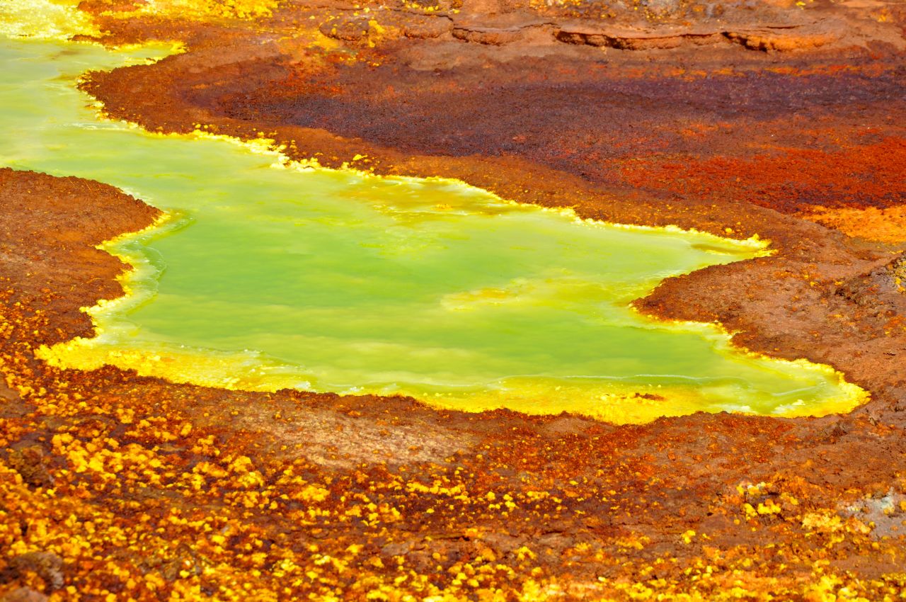 The inhospitable terrain of the Ethiopia's desert basin also features many acid pools. 