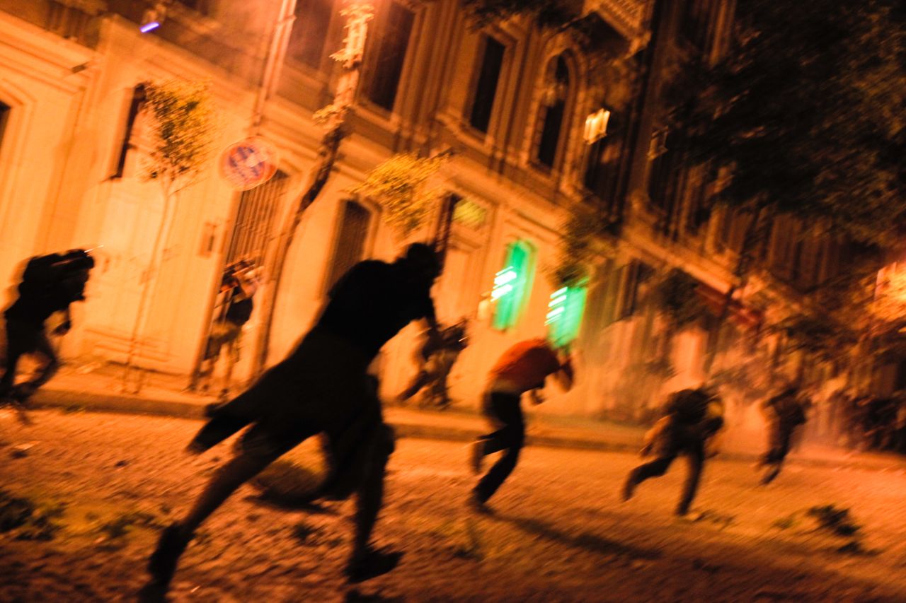 Turkish protesters clash with riot police near the prime minister's office between Taksim and Besiktas early June 3.