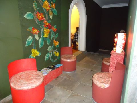  A number of ASMARE's employees are the formerly homeless, ex-convicts or individuals who have stumbled upon hard times and are seeking to readjust to society. Pictured are seats and a sculpture made by members of the collective. A 2010 report by the Business Commitment for Recycling association estimated that there were around one million <em>catadores</em> in Brazil.