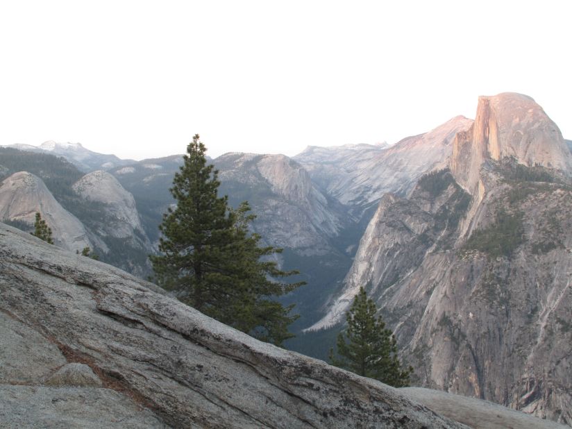 Drive up to Glacier Point to get a sense of Yosemite's size and get an impressive view of Half Dome (seen here at sunset from Glacier Point).