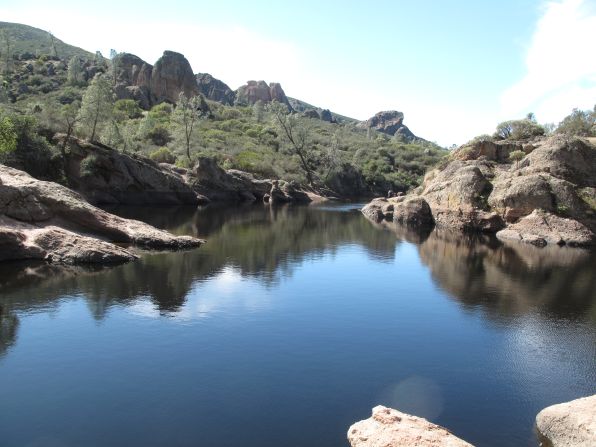 Ranger Kirsten Randolph's other favorite national park is Pinnacles National Park. The Bear Gulch Reservoir along the Bear Gulch Cave Trail is a prime spot. 