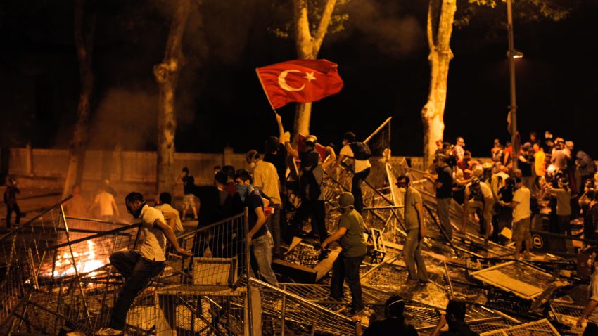 Protestors clash with riot police between Taksim and Besiktas in Istanbul, on June 1, 2013, during a demonstration against the demolition of the park. 