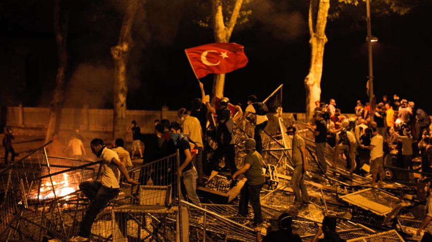 Protestors clash with riot police between Taksim and Besiktas in Istanbul, on June 1, 2013, during a demonstration against the demolition of the park.