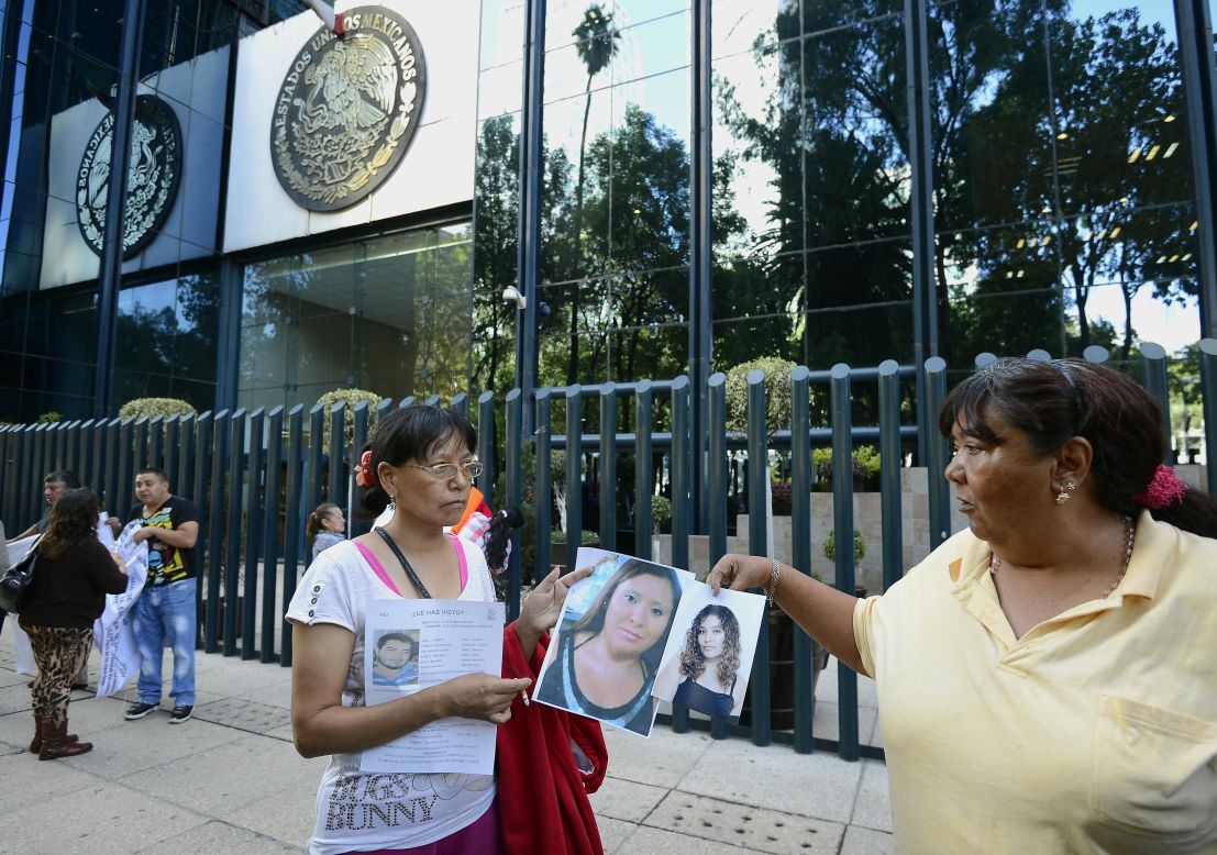 Relatives of the 12 missing youth protest in front of the general attorney's office in Mexico City on May 31.