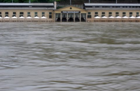 Floodwaters surround a restaurant in Prague on June 3.