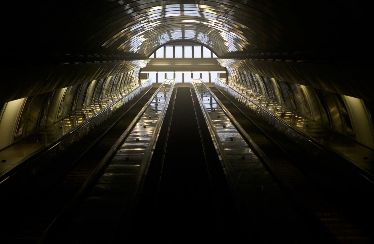 Subway escalators stand empty in a train station in Prague on Sunday, June 2.