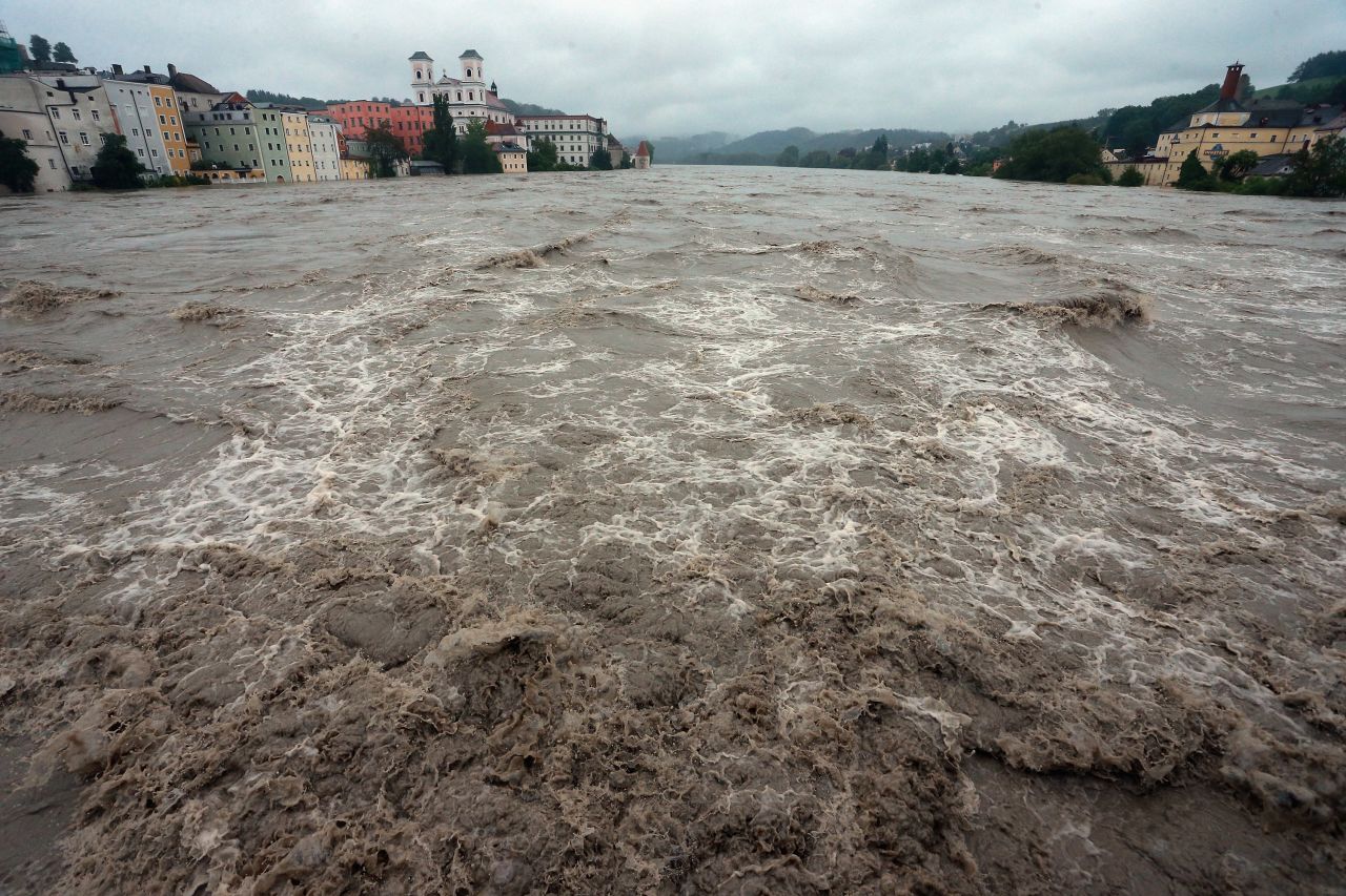 The swollen Inn River rushes through downtown Passau, Germany, on June 3.
