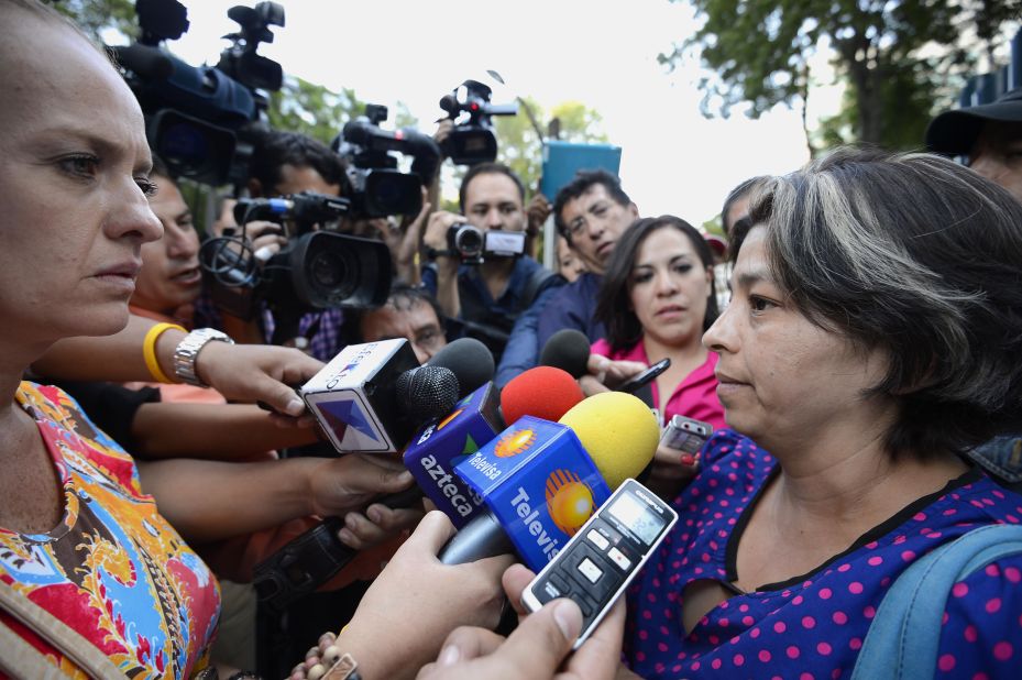 Relatives speak to media in front of the general attorney's office in Mexico City on May 31.
