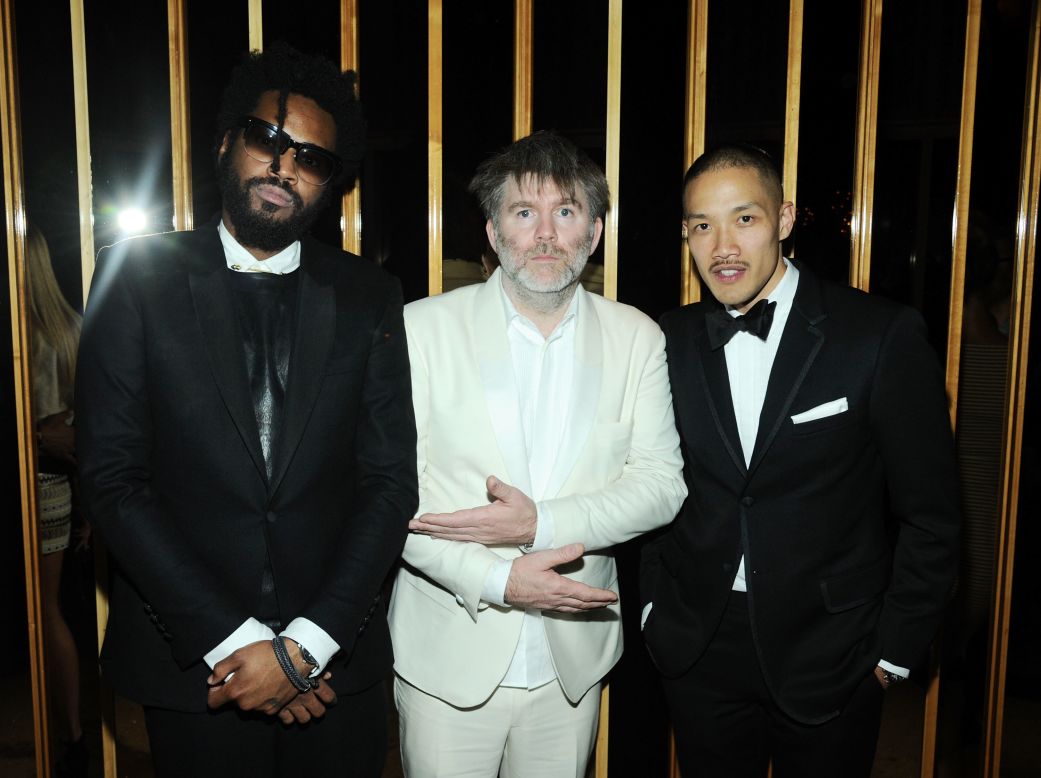 Musician James Murphy, center, rubs elbows with designers Dao-yi Chow, right, and Maxwell Osborne of <a href="http://cfda.com/designer/public-school" target="_blank" target="_blank">Public School</a>, winners of the Swarovski Award for Menswear recognizing emerging talent.