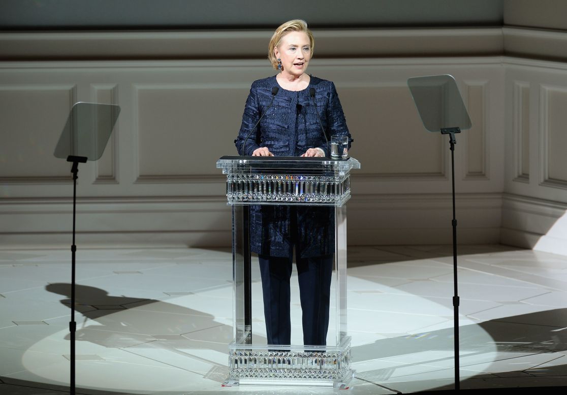 Former Secretary of State Hillary Rodham Clinton takes the podium to introduce <a href="http://cfda.com/members#!oscar-de-la-renta" target="_blank" target="_blank">Oscar de la Renta</a>, winner of this year's Founder's Award. <a href="http://nymag.com/thecut/2013/06/oscar-de-la-renta-hillary-clinton-cfda-henry-kissinger.html" target="_blank" target="_blank">Rumor has it</a> they both snuck out early to attend Henry Kissinger's 90th birthday party.