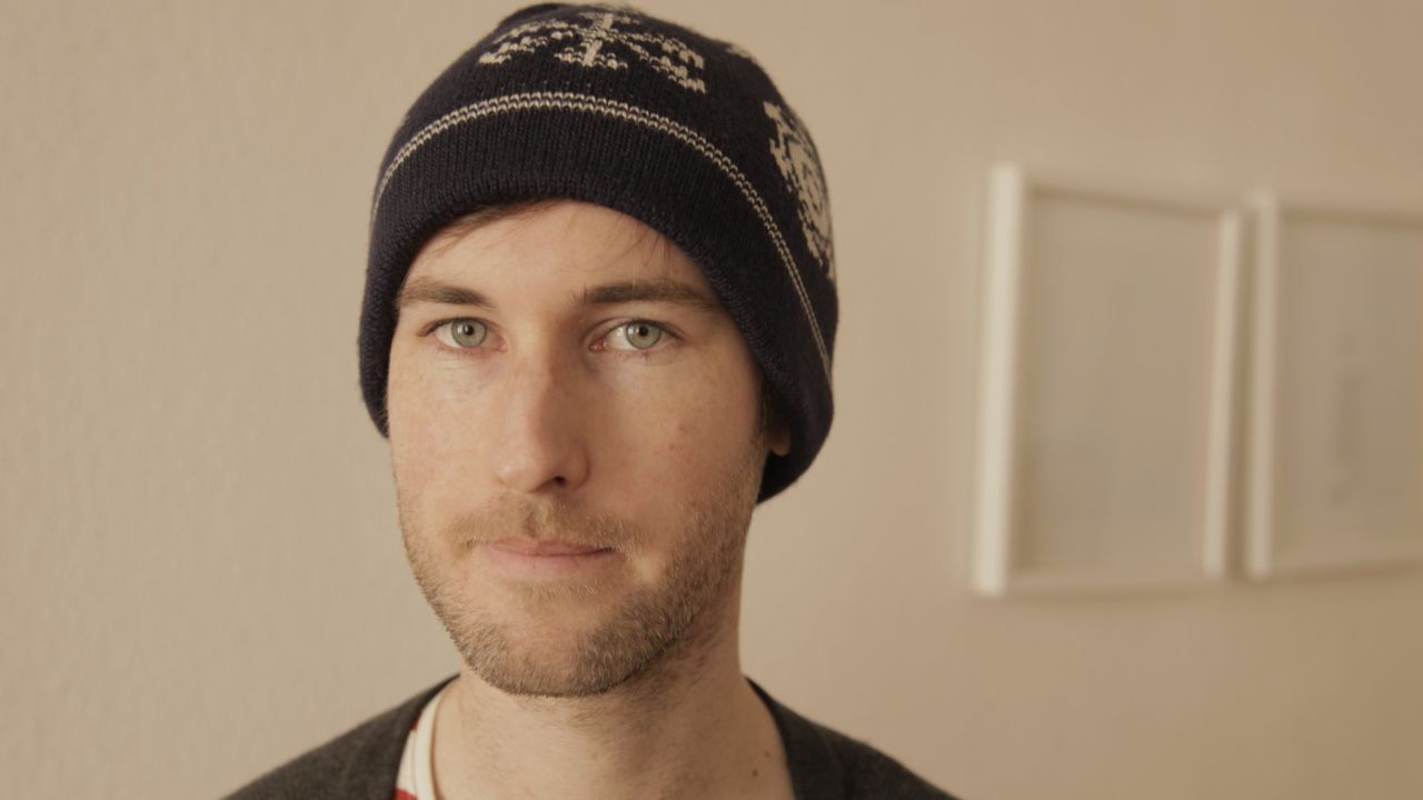 Sam Muirhead wearing his open-source woolly hat. 