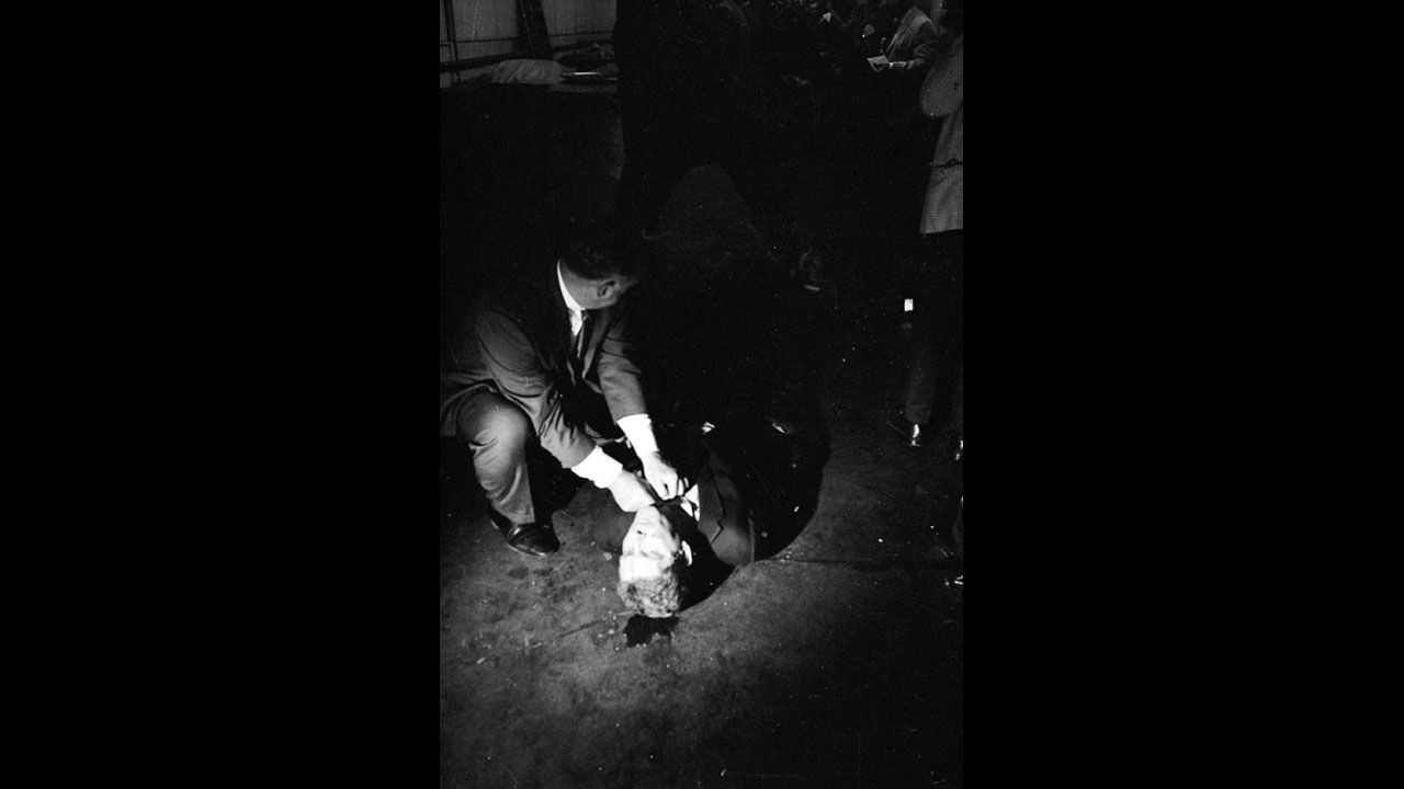 A wounded Paul Schrade, a regional director of the United Auto Workers Union, labor chair of Robert Kennedy's campaign and one of five other people shot by Sirhan Sirhan, on the floor of the kitchen at the Ambassador Hotel, June 5, 1968.