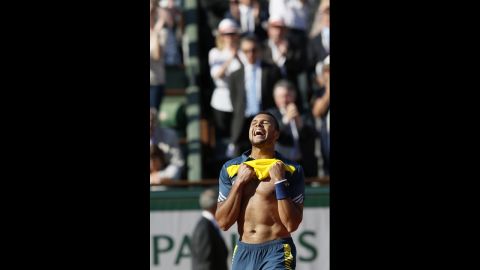 Tsonga celebrates his victory over Federer on June 4 as he advances to the semifinals.