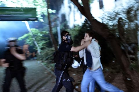 Turkish police detain a demonstrator during clashes in Istanbul on June 4.