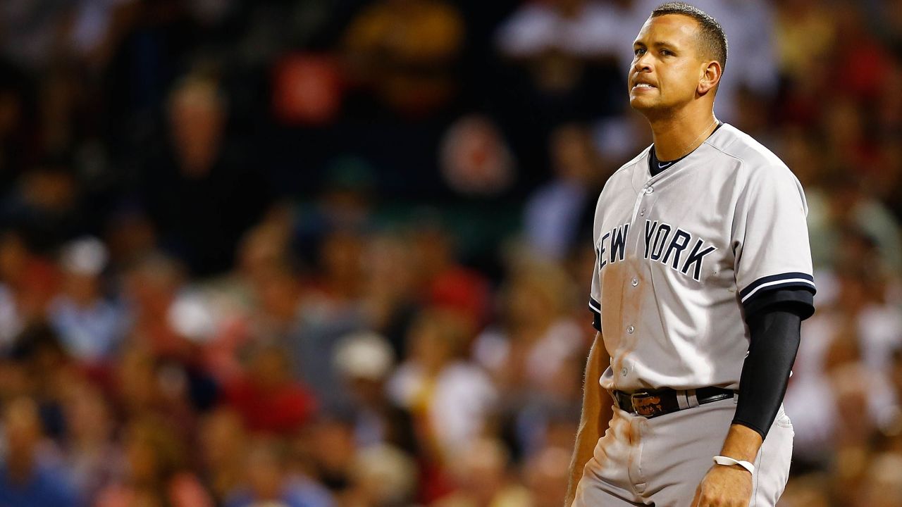 BOSTON, MA - SEPTEMBER 13: Alex Rodriguez #13 of the New York Yankees reacts after striking out in the 7th inning against the Boston Red Sox during the game on September 13, 2012 at Fenway Park in Boston, Massachusetts. (Photo by Jared Wickerham/Getty Images)