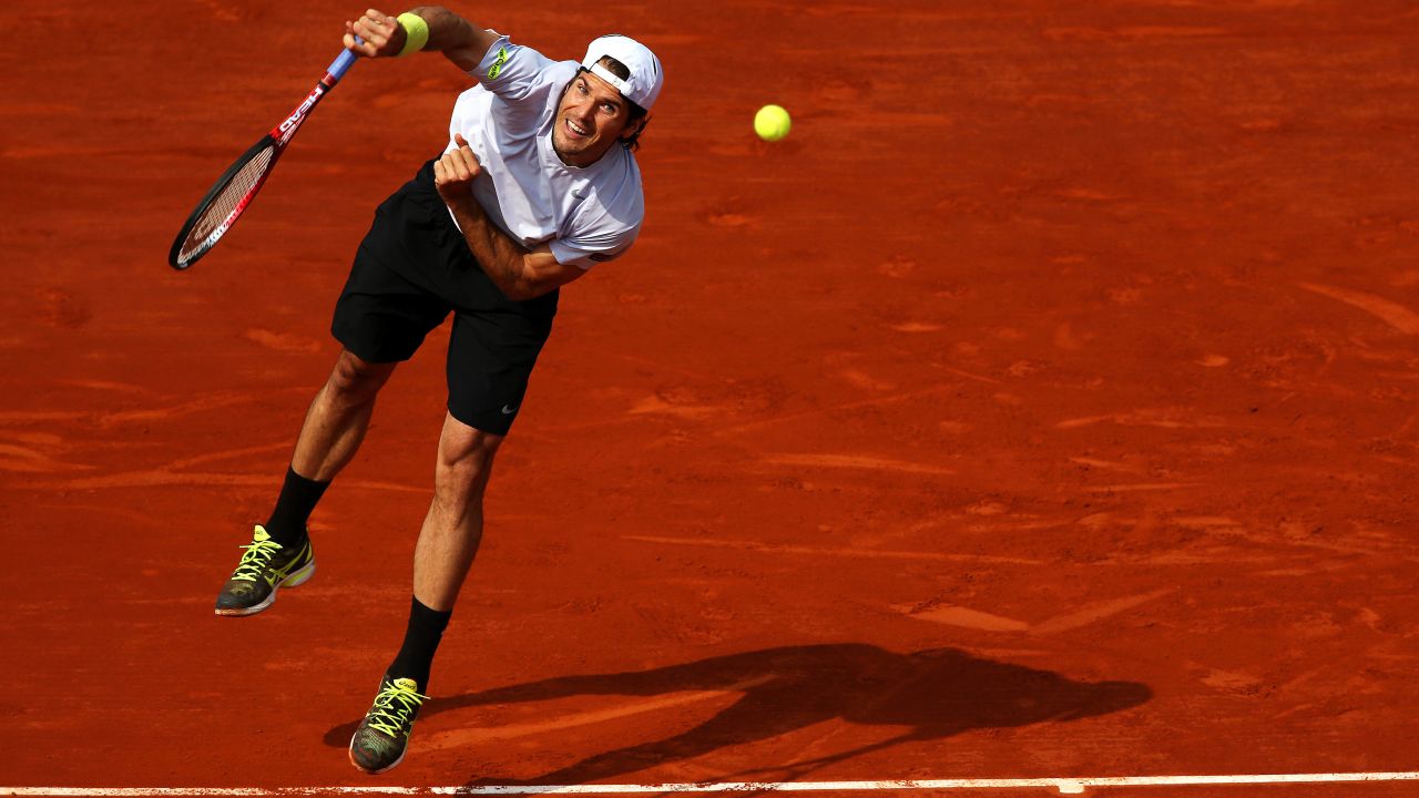 Tommy Haas of Germany serves during his quarterfinal match against Novak Djokovic of Serbia on June 5.