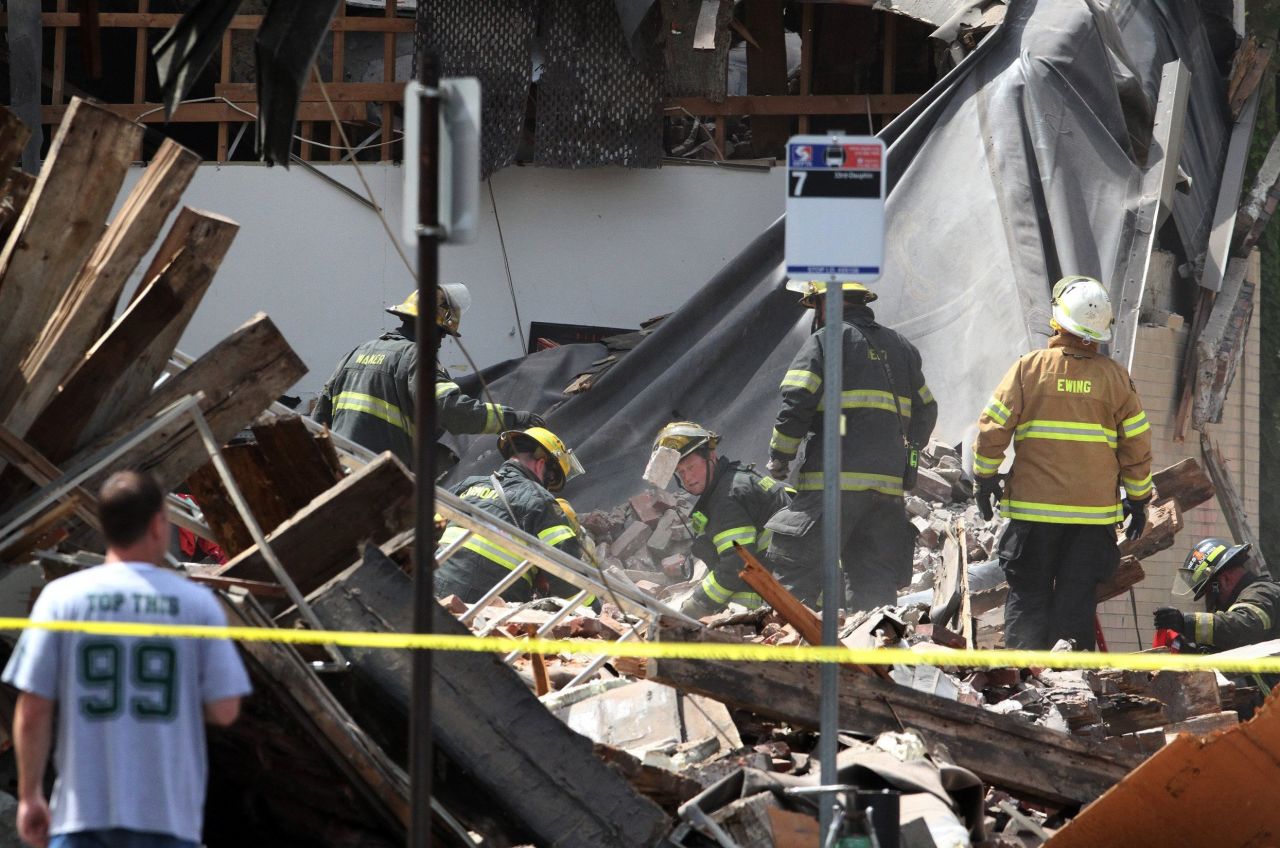 Firefighters search through the rubble looking for survivors.