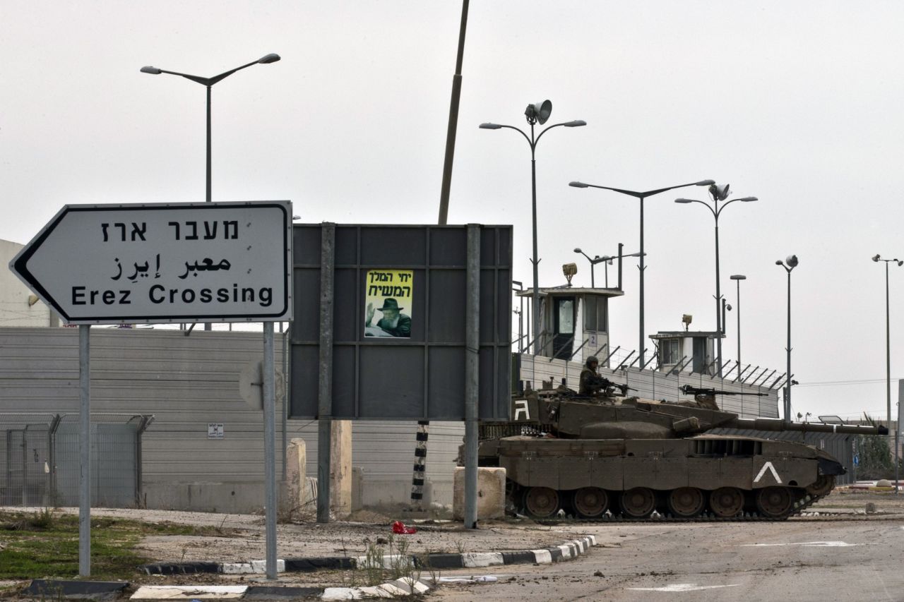An Israeli army tank is seen along the Erez crossing passage along the southern Israeli border with the Palestinian Gaza Strip in November 2012. Sarsak was arrested at the crossing in 2009. <br /> 