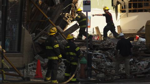 Firefighters search through the rubble of a collapsed building in Philadelphia after an apparent demolition accident on Wednesday, June 5.