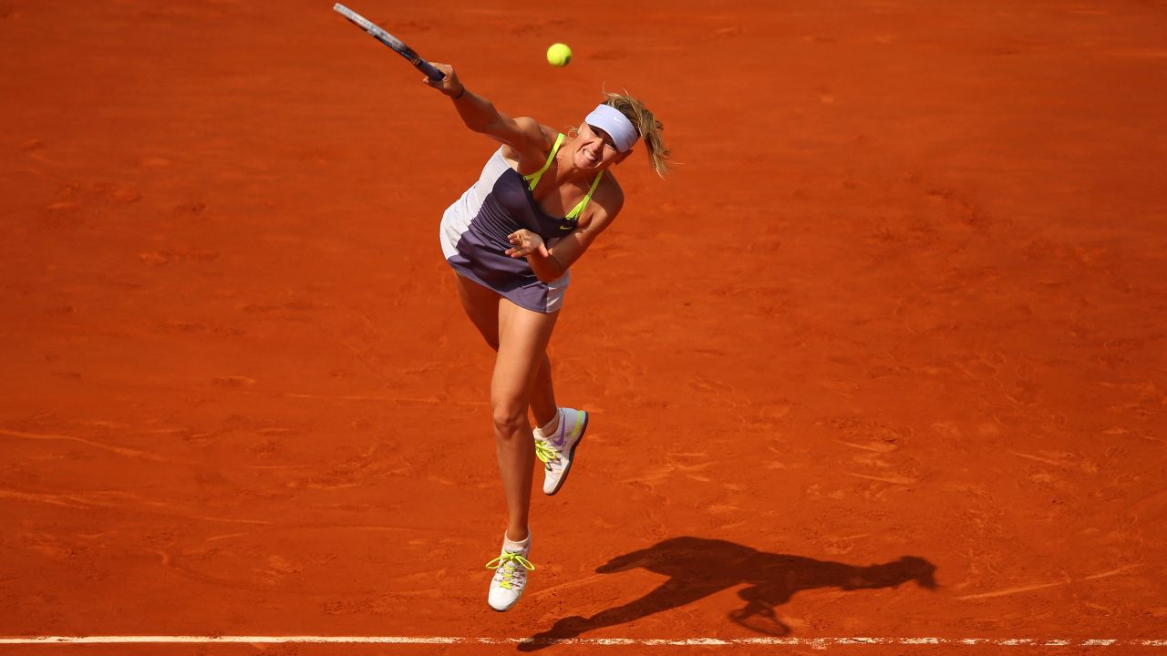 Maria Sharapova of Russia serves to Victoria Azarenka of Belarus during their semifinal match of the French Open at Roland Garros in Paris, on June 6. 