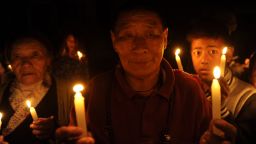 Tibetans-in-exile hold a vigil in Kathmandu, Nepal, following the self-immolation of a monk in protest against Chinese rule.